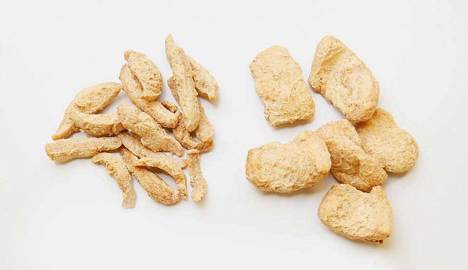 A detail view of different dried forms of Improved Nature's Improved Meat product